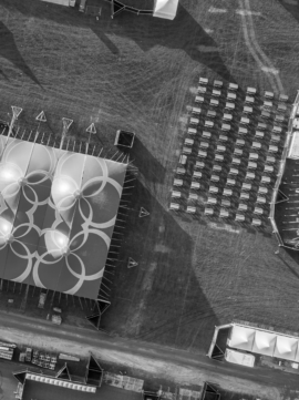 Aerial shot of an event stadium setup, showcasing the stage and seating arrangements.