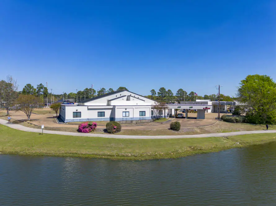 Aerial photograph of a commercial bank property beside a lake in Flowood, Mississippi
